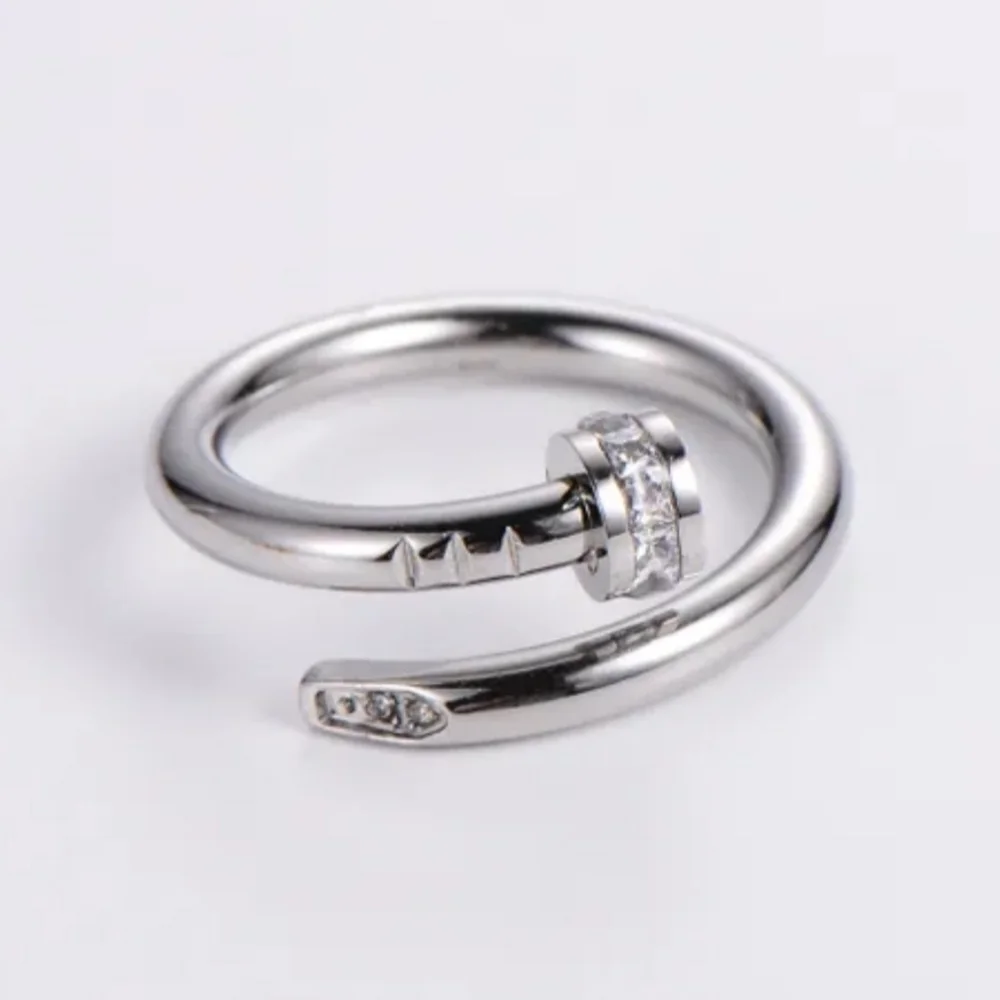 Stainless steel silver tone nail ring nwt